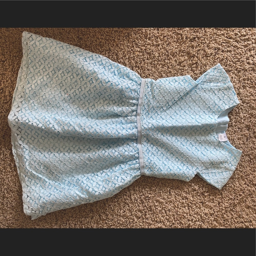 Baby blue lace dress with ribbon detail.  Girls size 6. Fully lined.  Very cute!